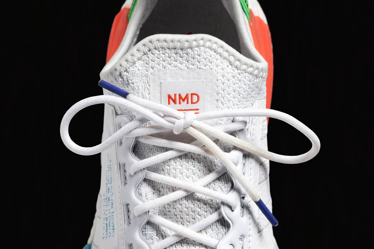 adidas NMD_R1 V2 "Glow In The Dark – White Sonic Ink" — Men's US 8.5 (GX1398)